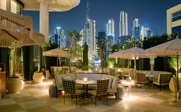 Image of Veranda design and food at The Lana - Dorchester Collection