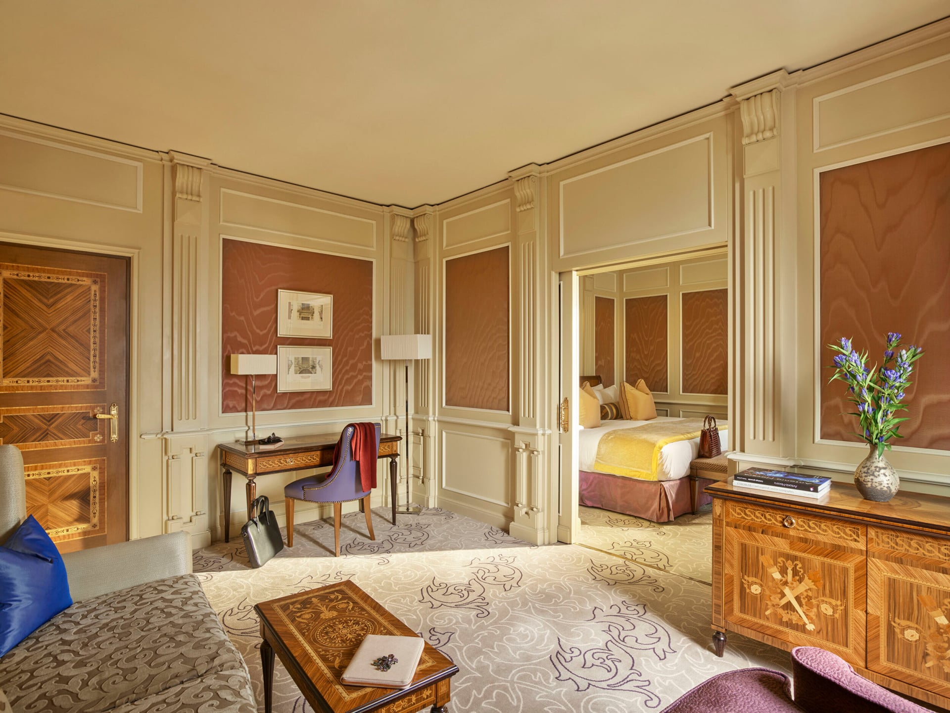 Ambassador Suite Living Room showing the study corner and a small glimpse of the bedroom