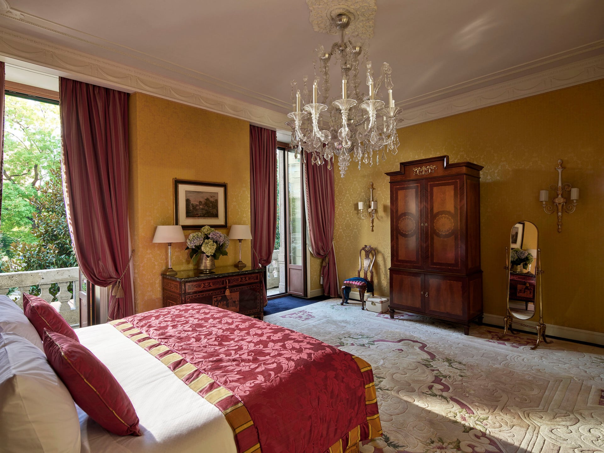 Royal Suite Bedroom revealing the majestic chandelier hanging from the ceiling