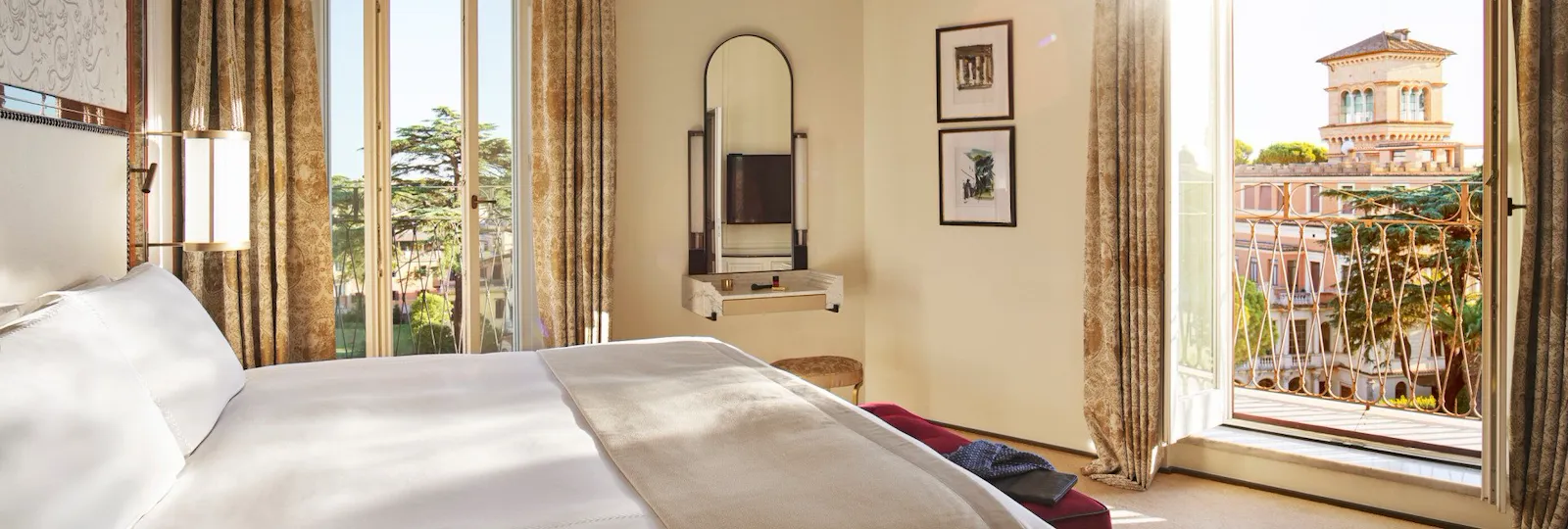 Bedroom of Villa Medici Presidential Suite with view of Villa Malta at Hotel Eden, Rome