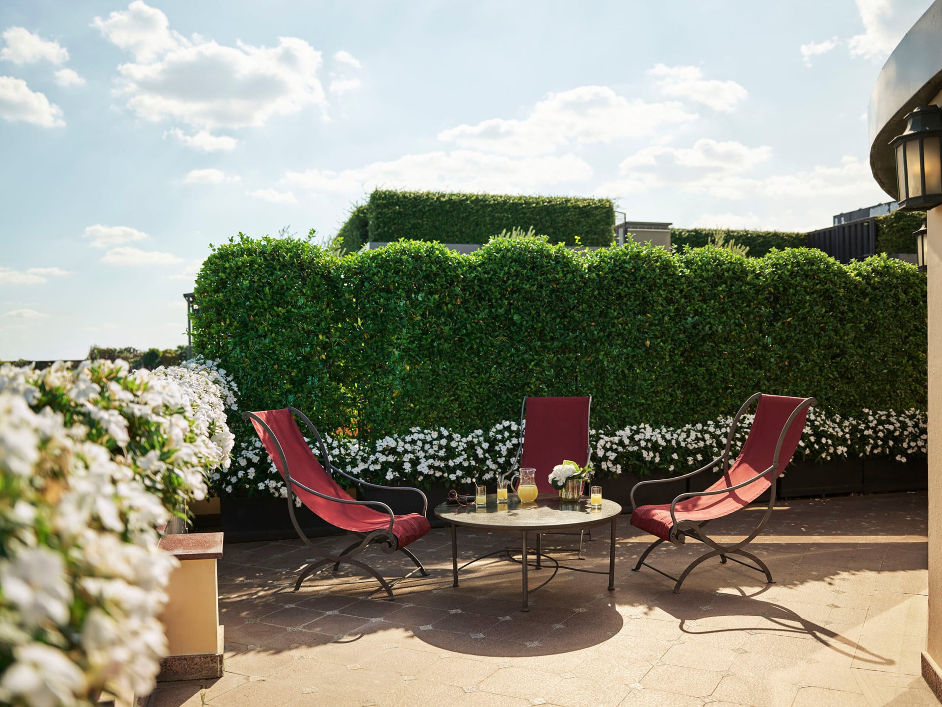 Presidential Suite Terrace with details of armchairs on a beautiful sunny day 