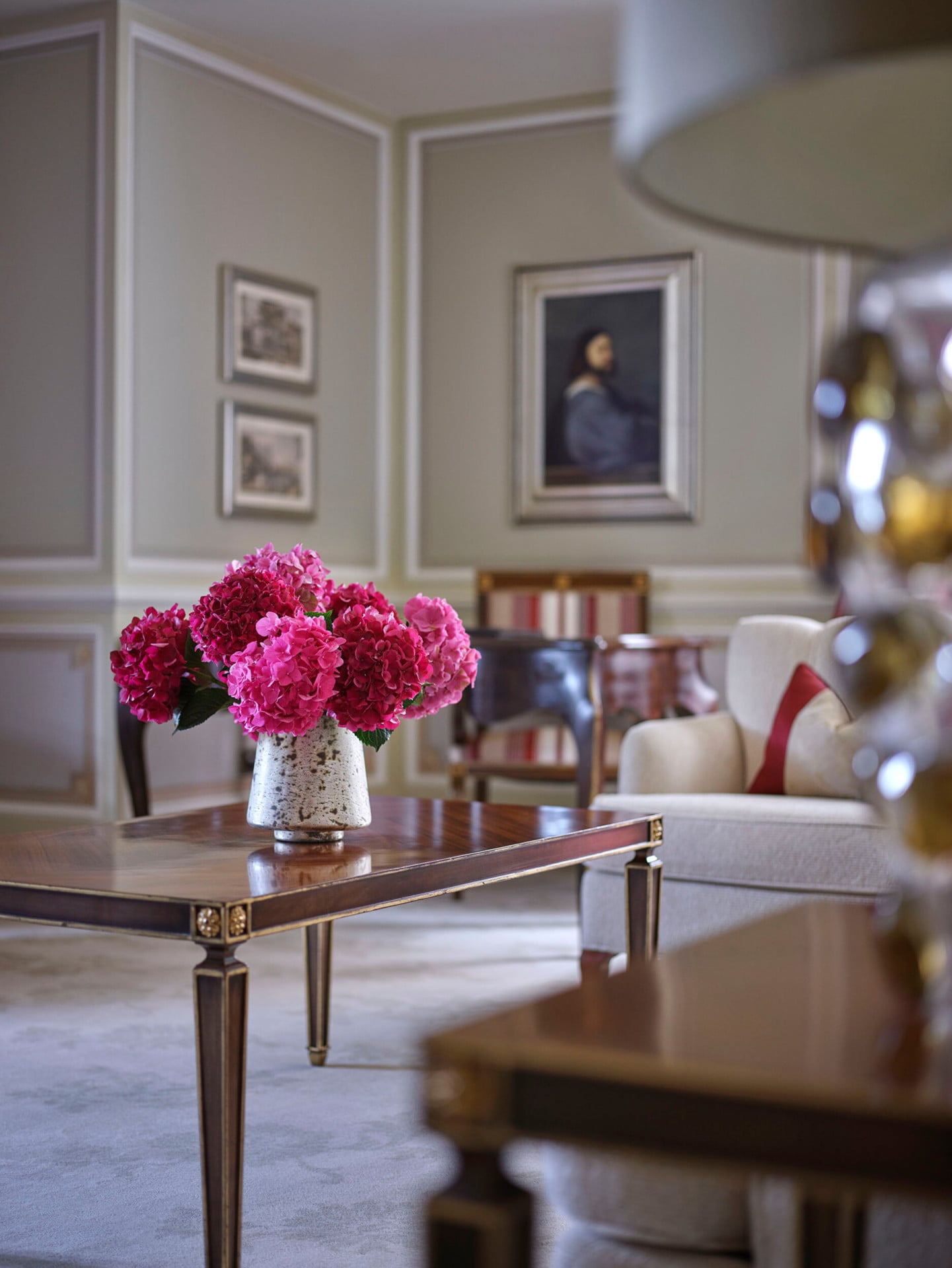 Principe Suite Living Room Close-up with with a bouquet of pink flowers