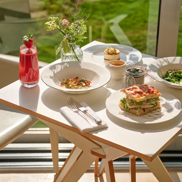 Light lunch spread with garden views at the Spa café, Coworth Park in Ascot