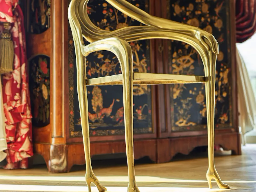 Gold chair and furniture in the Presidential appartment at le Meurice, Paris.