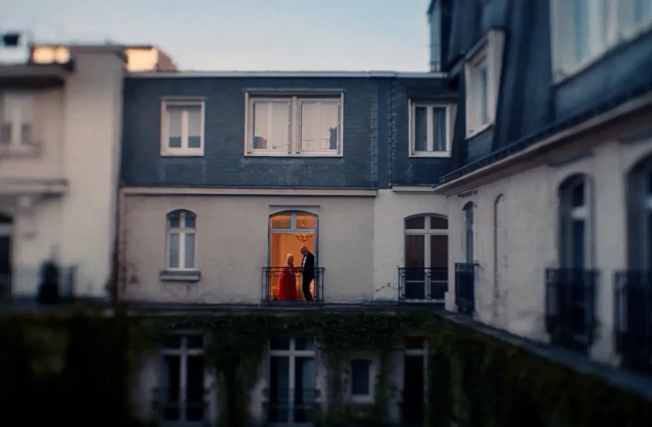A couple dancing in hotel room Paris