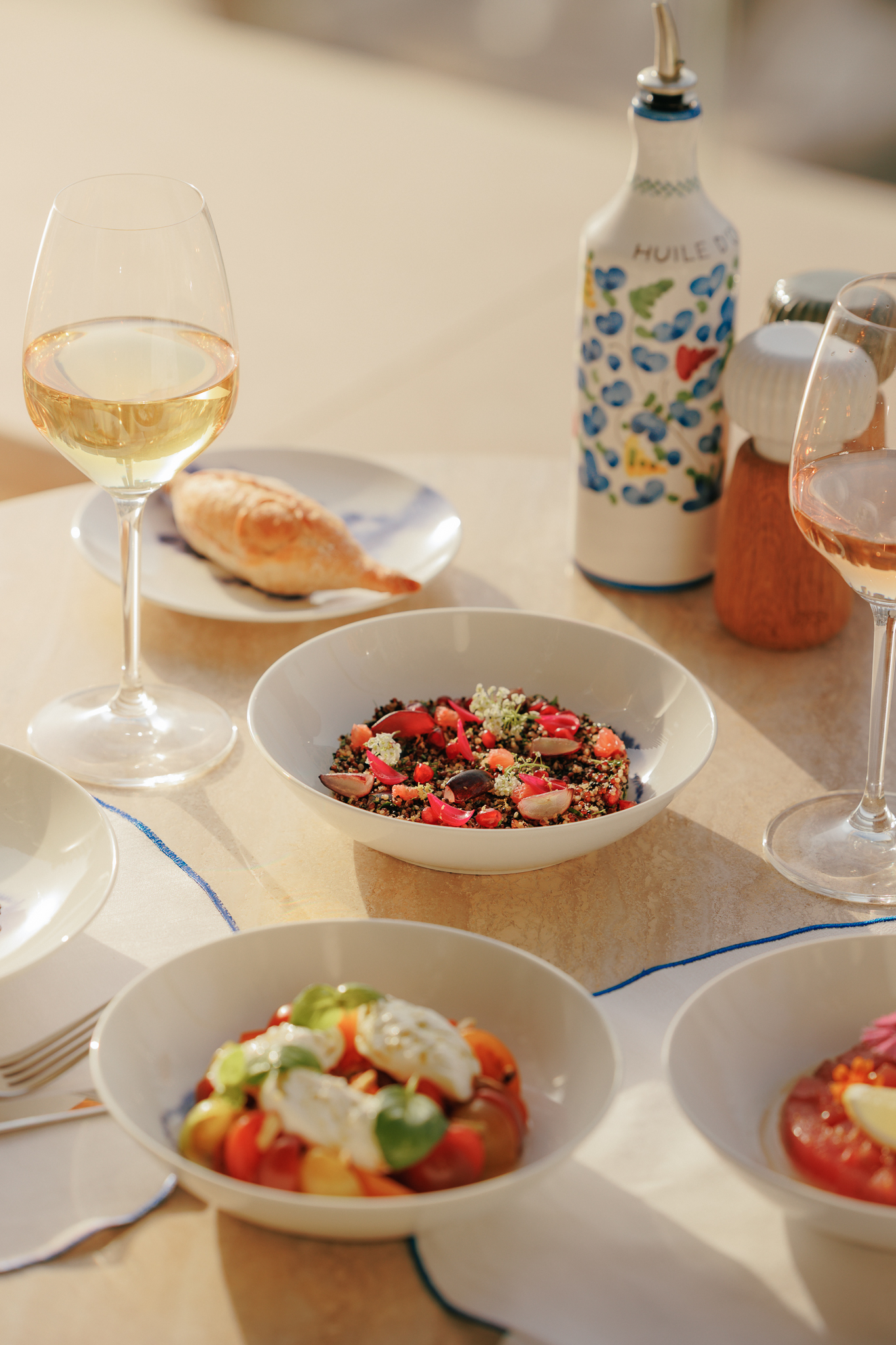 The main dishes and two glasses of wine in Riviera