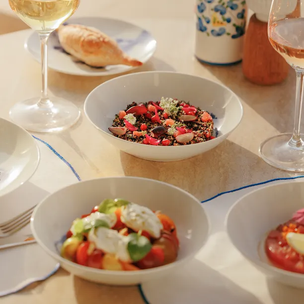 The main dishes and two glasses of wine in Riviera