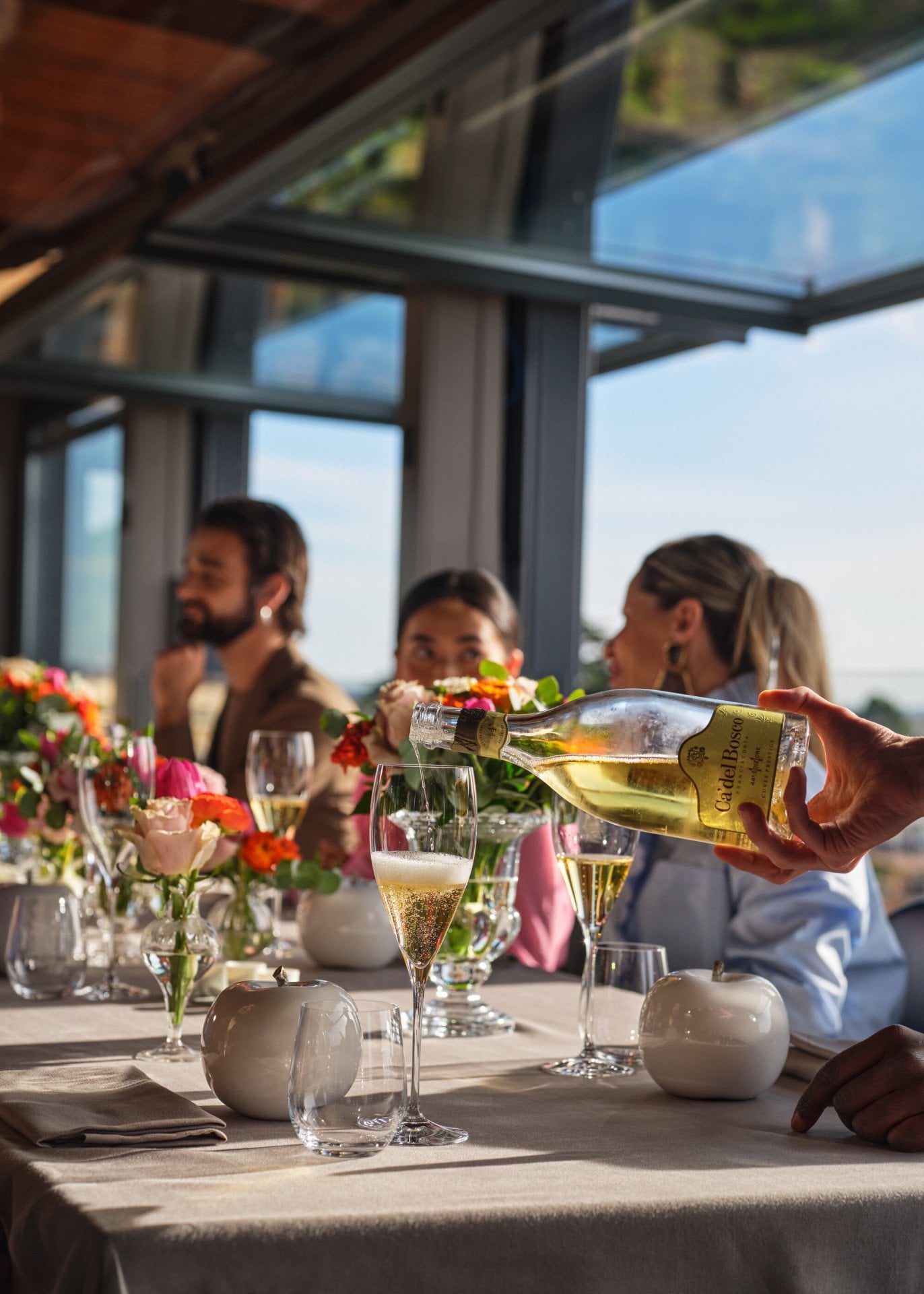 Waiter serving prosecco at La Terrazza 