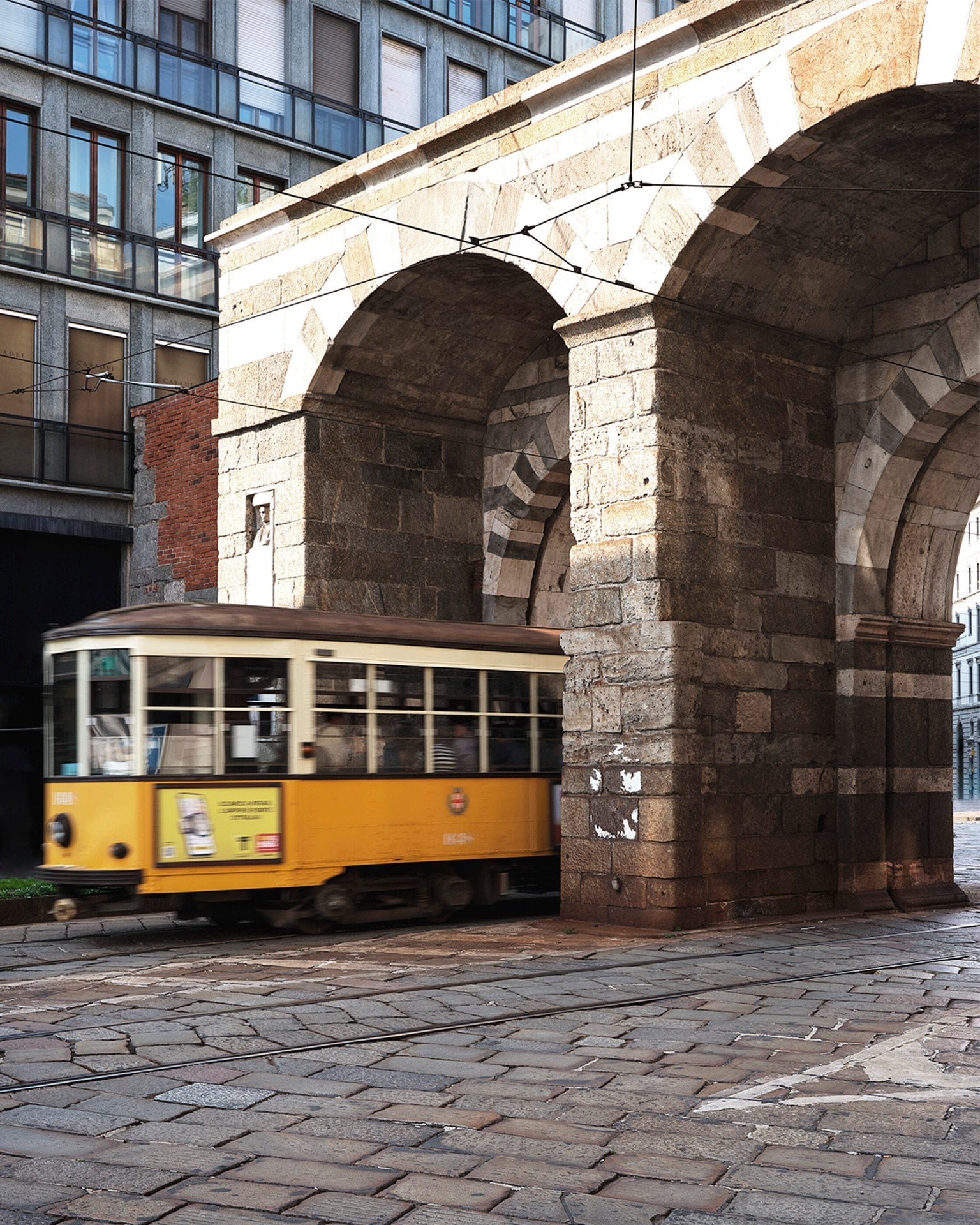 View of Porta Venezia in Milan with a tram in the foreground 
