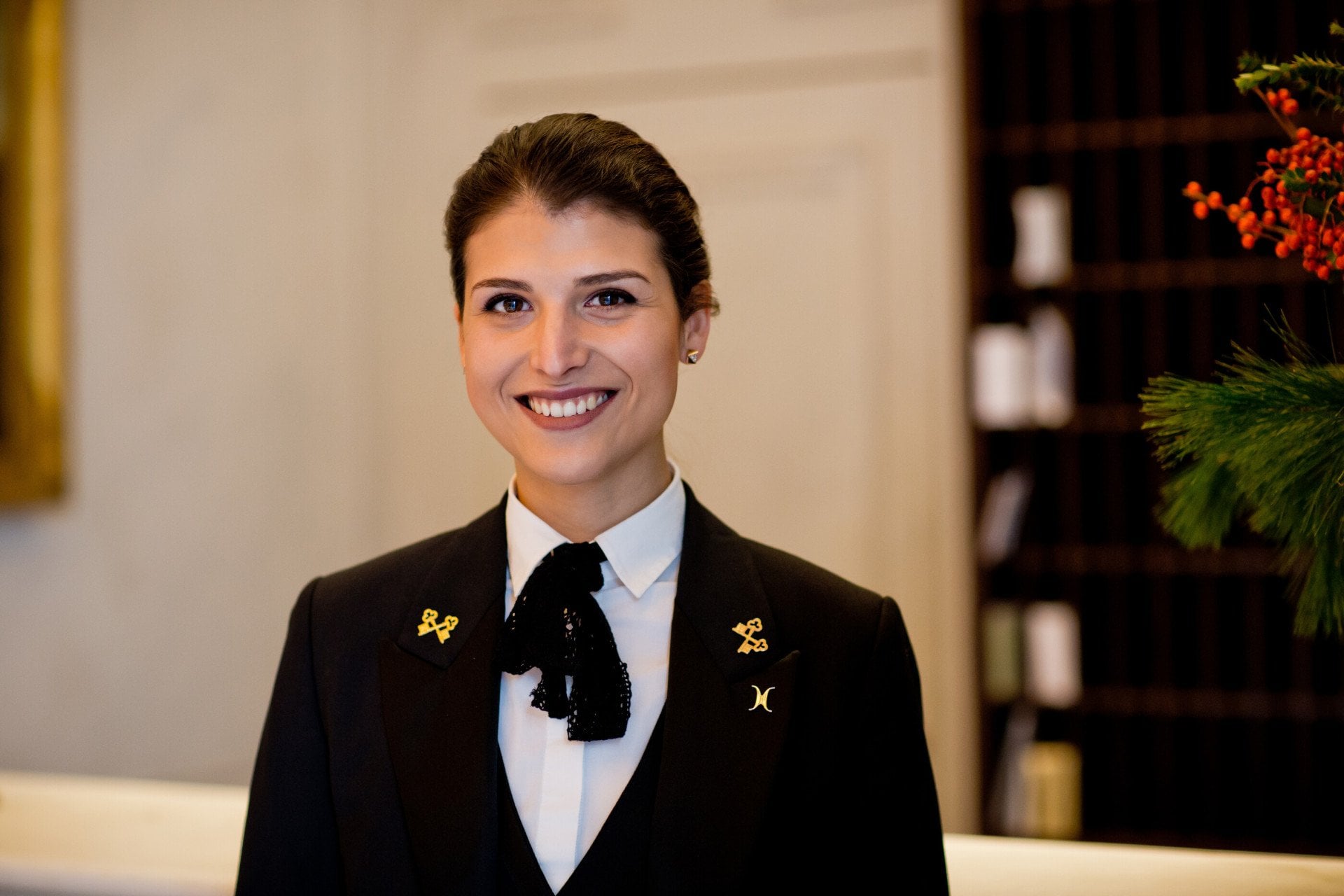 Portrait of Ana De Castro, Concierge, at concierge desk at Hotel Eden, Rome
