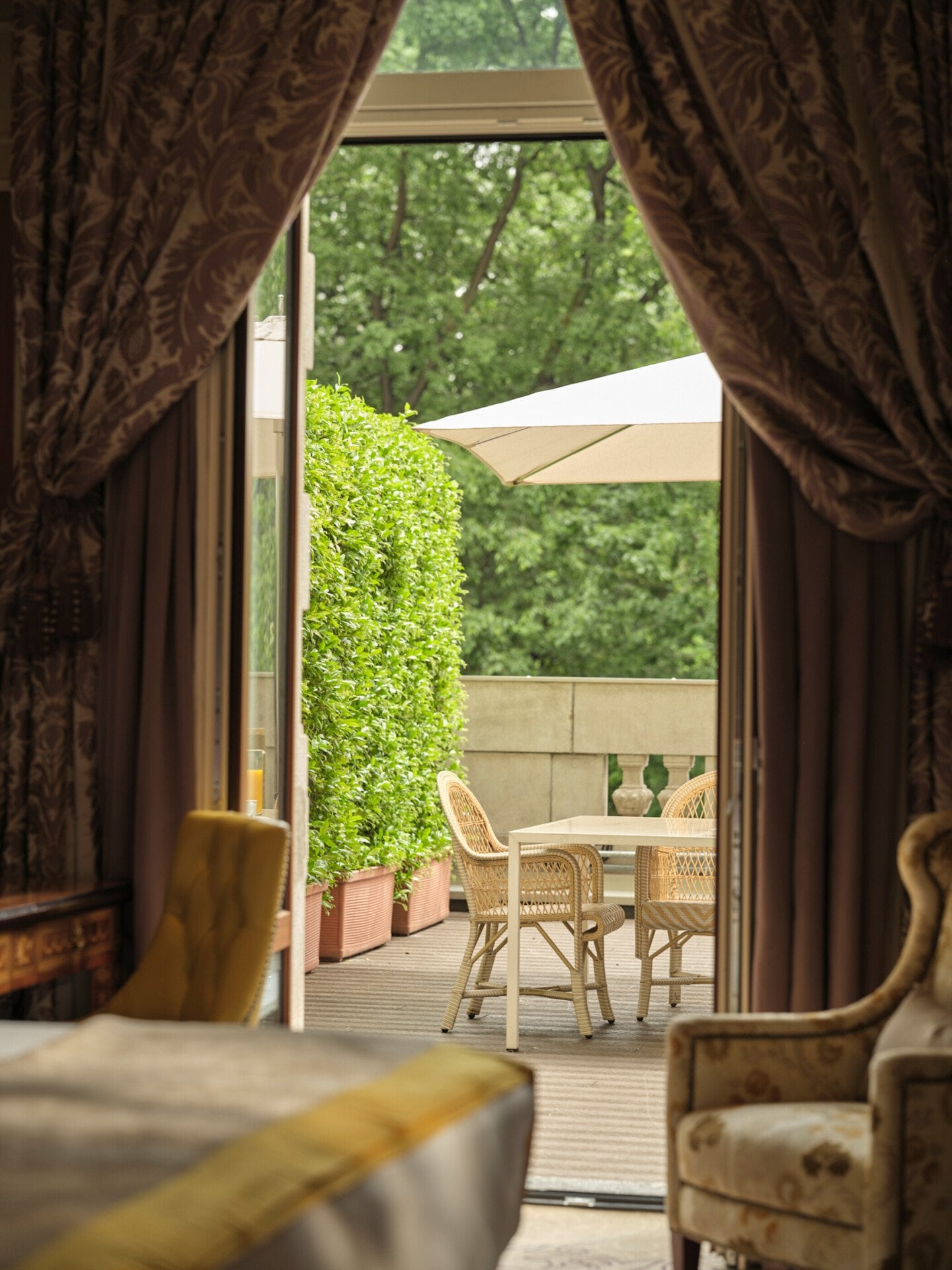 View of the terrace from the Deluxe Terrace Room with external forniture in the background
