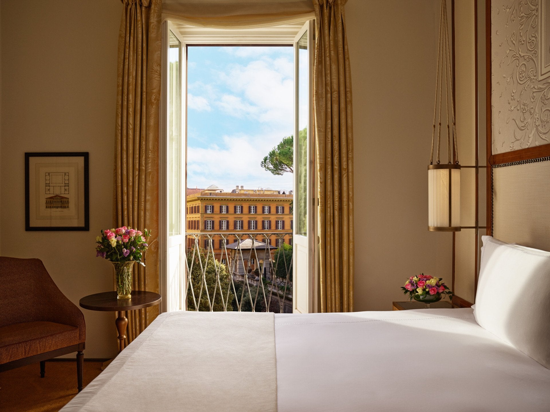 Bedroom of classic room with view, with open window looking at via Ludovisi, Hotel Eden, Rome