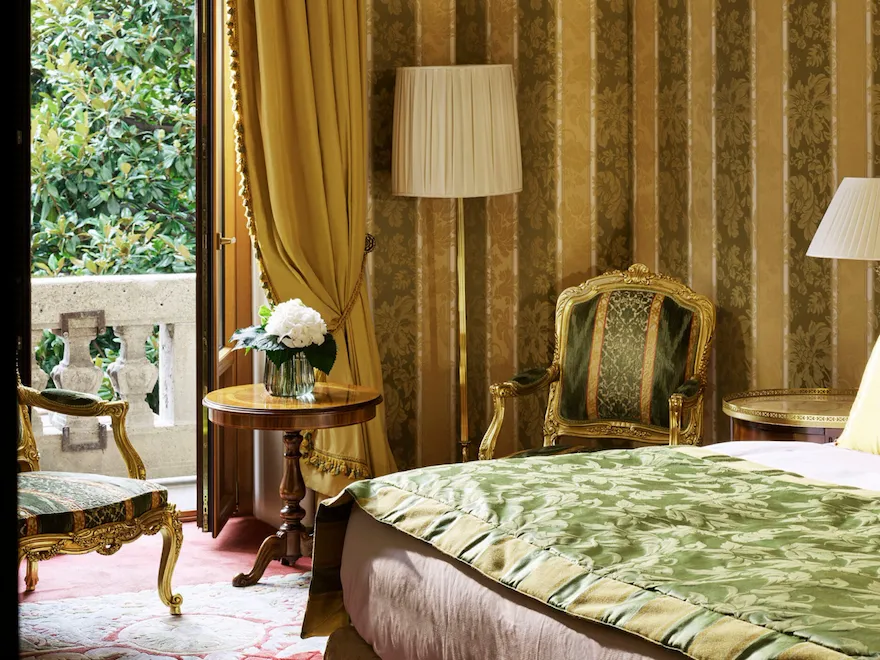 Royal Suite Bedroom Detail of the yellow and green wallpaper matching with the bed decorations