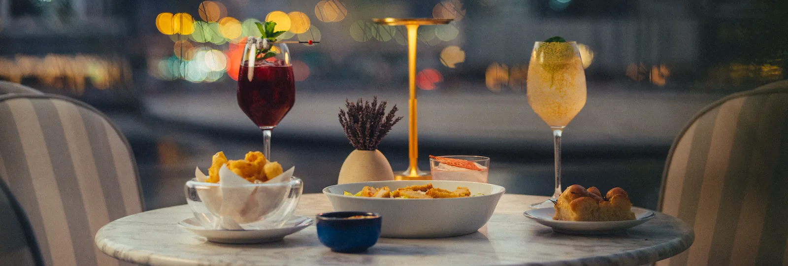 Drinks on terrace's table during the night